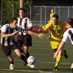 Ciaran O'Brien fights through the pack of Rangers.